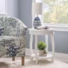 Lindsay Round Table With Shelf - Powell